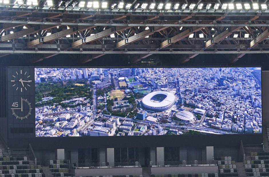 Giant video screen of approximately 9 m × 36 m (including 4 m on the left-hand side for the clock, 45-minute timer, and running timer). 